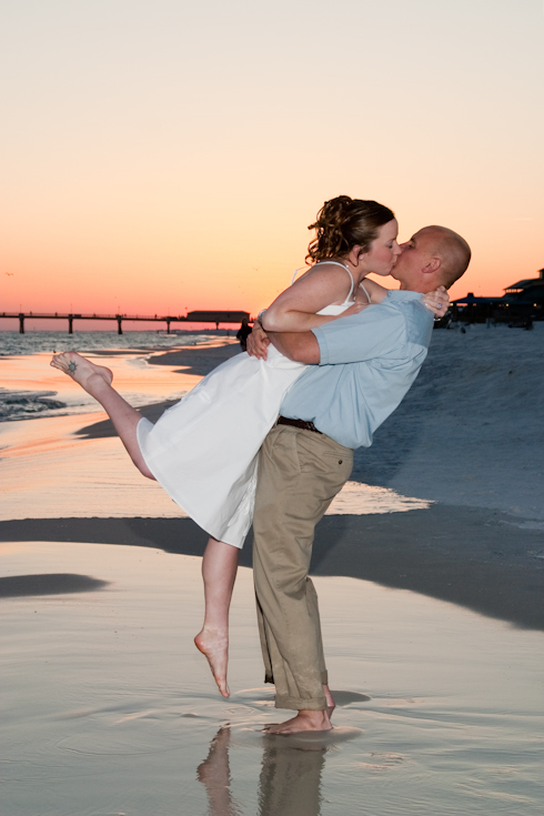Sunset wedding portraits have great color in the background