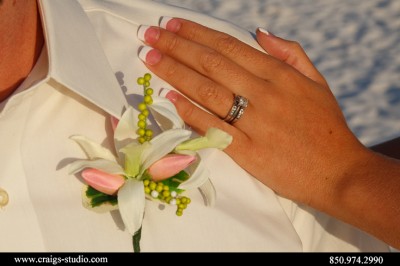 Close up of Kevin's flowers and Robyn's wedding rings