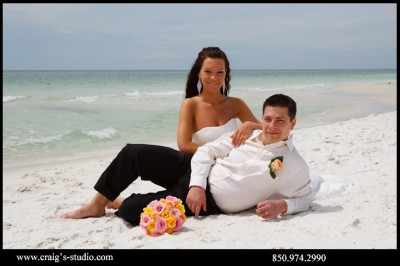 Bride and groom beach wedding portrait
